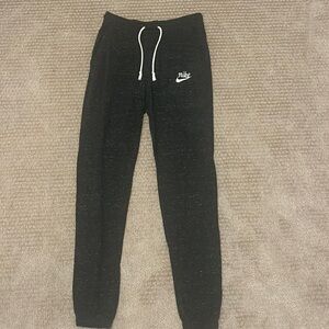 Black and white Nike sweatpants in size small.